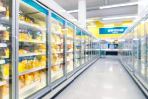 Commercial freezers in supermarket frozen section