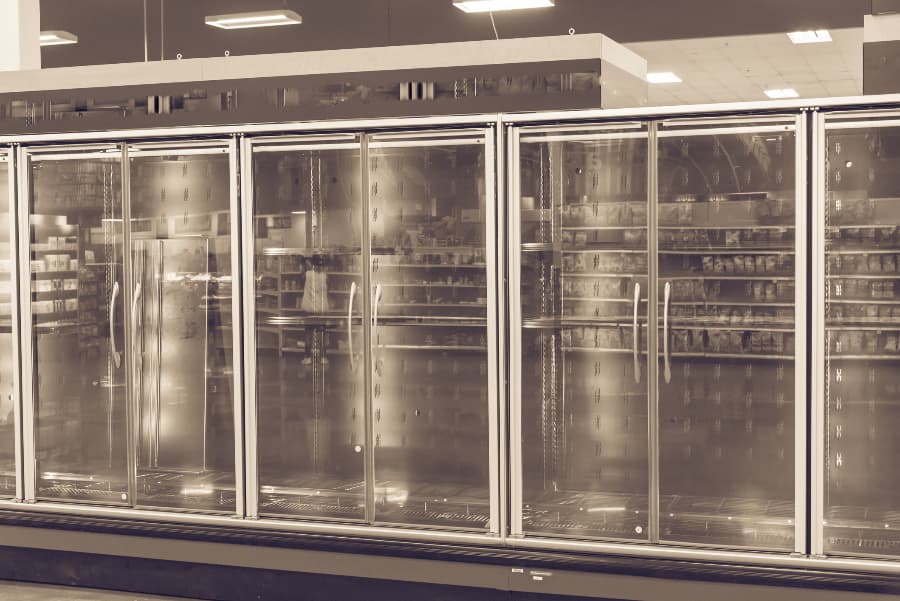 Empty commercial fridges at grocery store in America